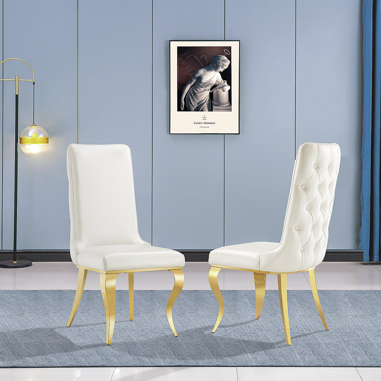 White chair best sale with gold legs